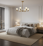 Modern bedroom with a chandelier, bed, and nightstands.
